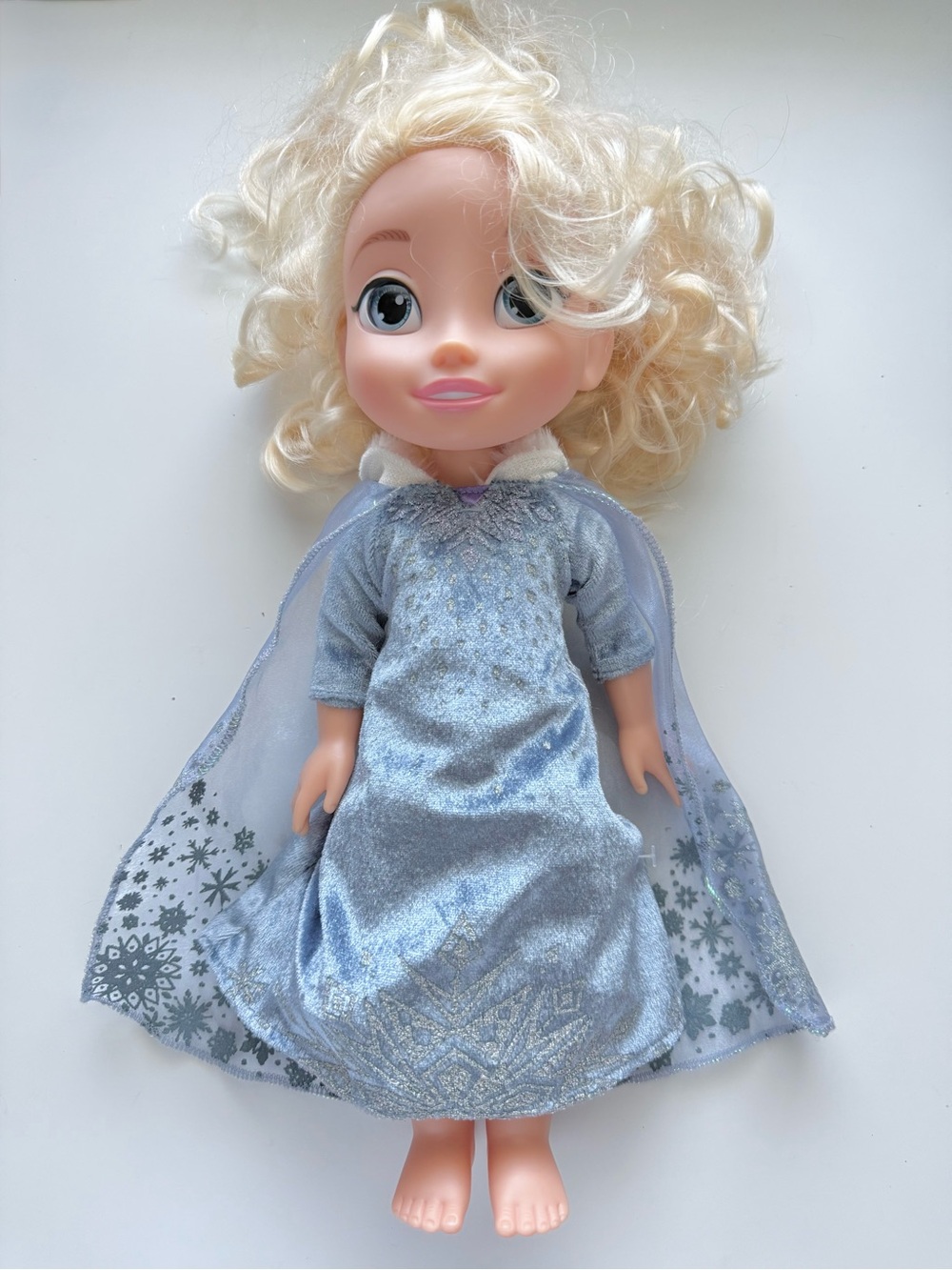 Disney Frozen Singing Elsa doll features a light-up dress and sings